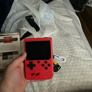 Small Portable gaming console 200 game capacity